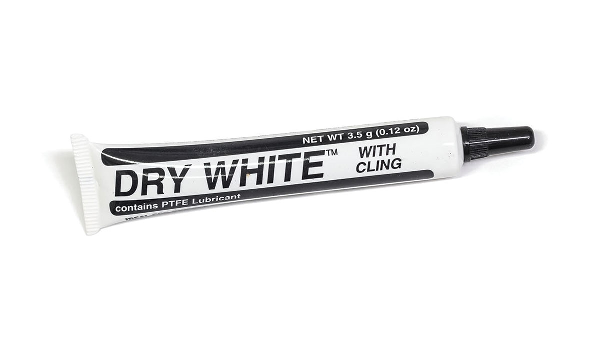 Dry White With Cling - This non-staining, fine, white PTFE lubricant contains an additive that clings to smooth surfaces