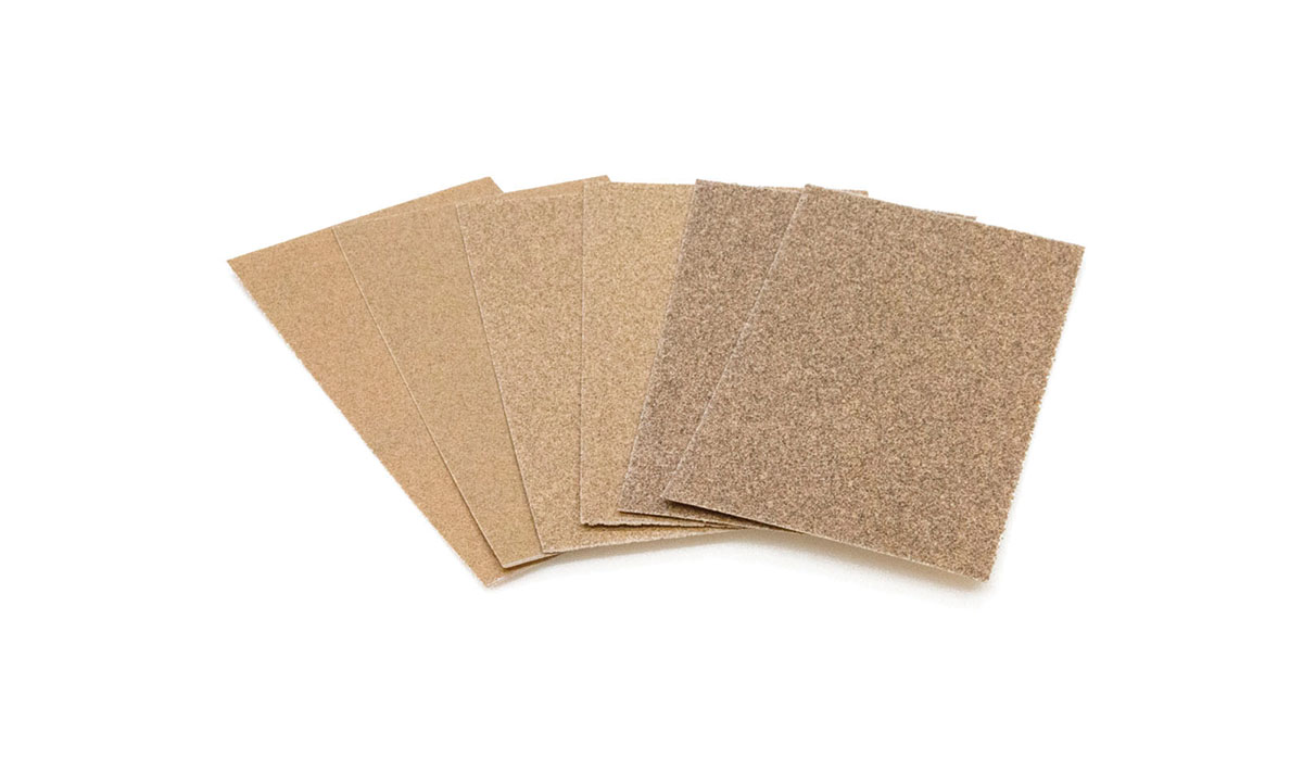 Sandpaper Assortment - This assortment has different grades that fit around a small wooden block easily to make a sanding tool